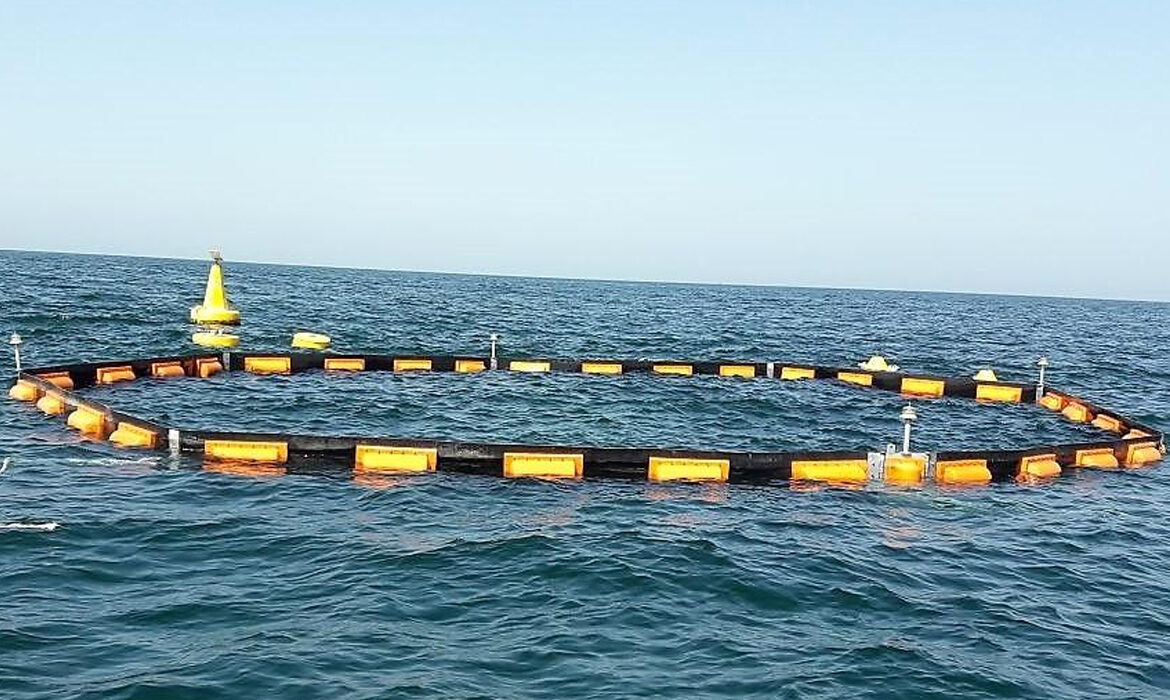 Manufacture and installation of permanent oil and debris barrier around desalination intake screens.