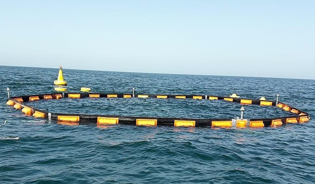 Manufacture and installation of permanent oil and debris barrier around desalination intake screens.